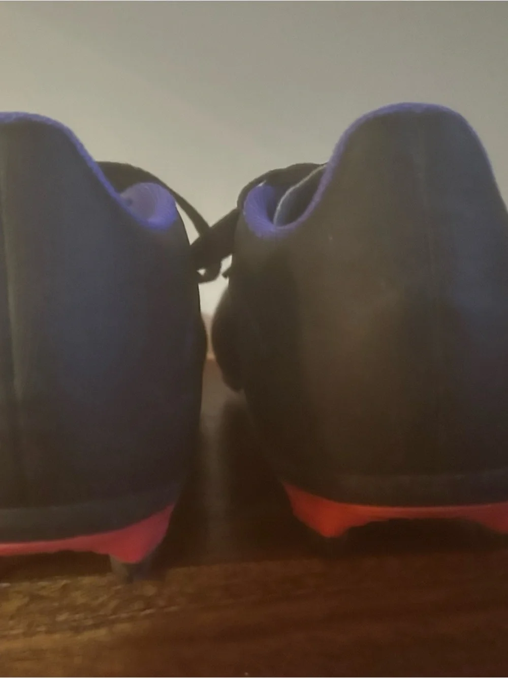 adidas Black Cleats with Blue Accents and Red Studs